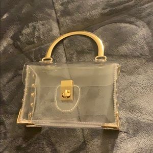 Clear top Handle purse with gold hardware